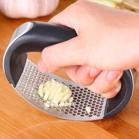 Image of Arc-Shaped Garlic Press